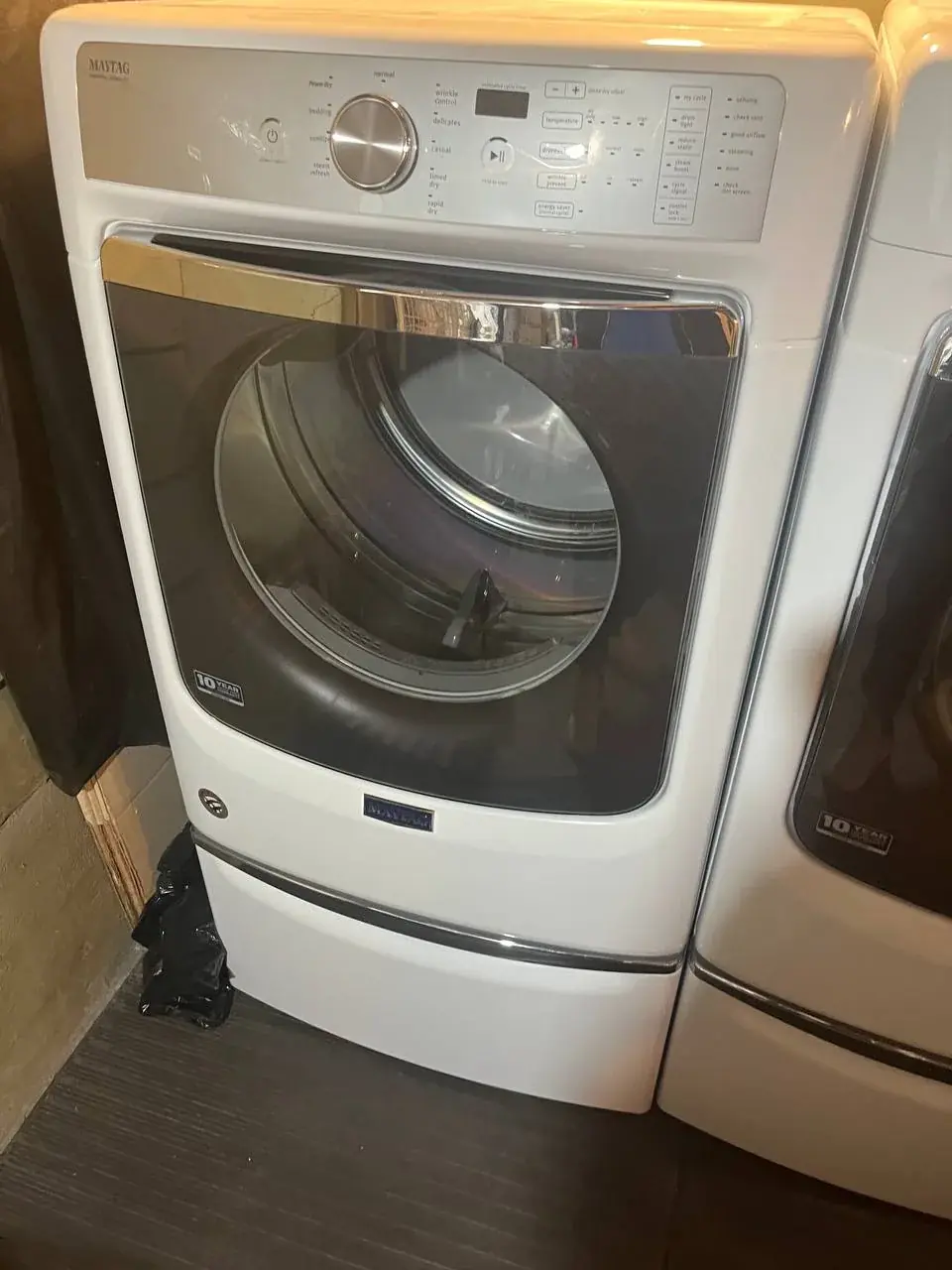 Front-load washer and dryer during service